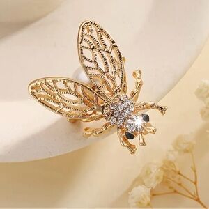 New, Adorable Golden Bee Brooch with Crystals and a Pearl body.